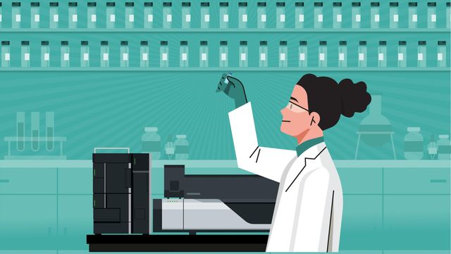 Scientist holding LC-MS vial 