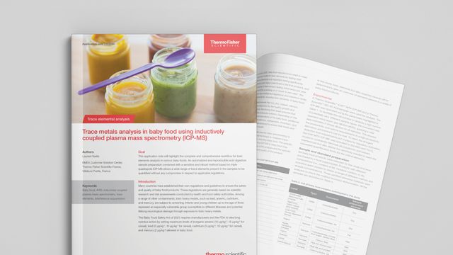 A selection of baby food jars with a purple spoon laid on top  