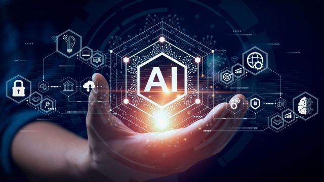 Glowing AI symbol and icons emerging from a persons hand. 